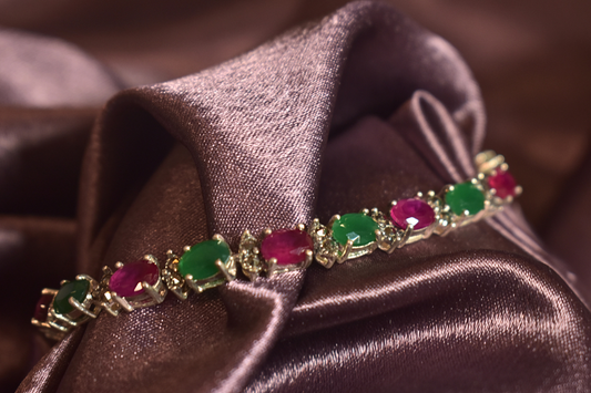 Silver hand chain With Emerald And Ruby Accent
