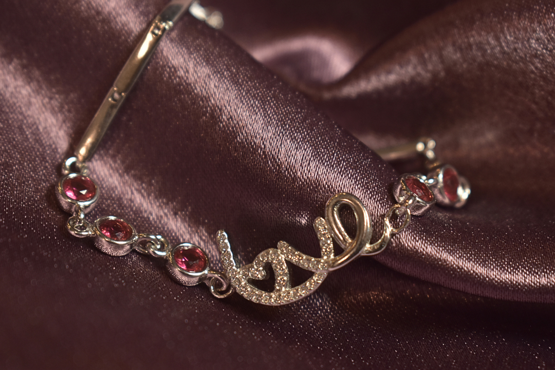 Love Script Bracelet with Vibrant Pink Accents