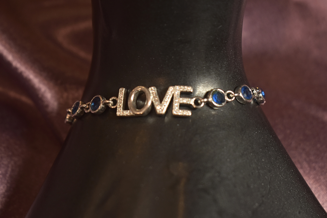 Love-Inspired Bracelet with Elegant Blue Accents
