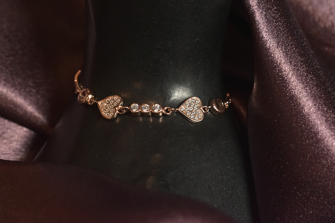 Elegant Heart Charm Bracelet with Crystal Details
