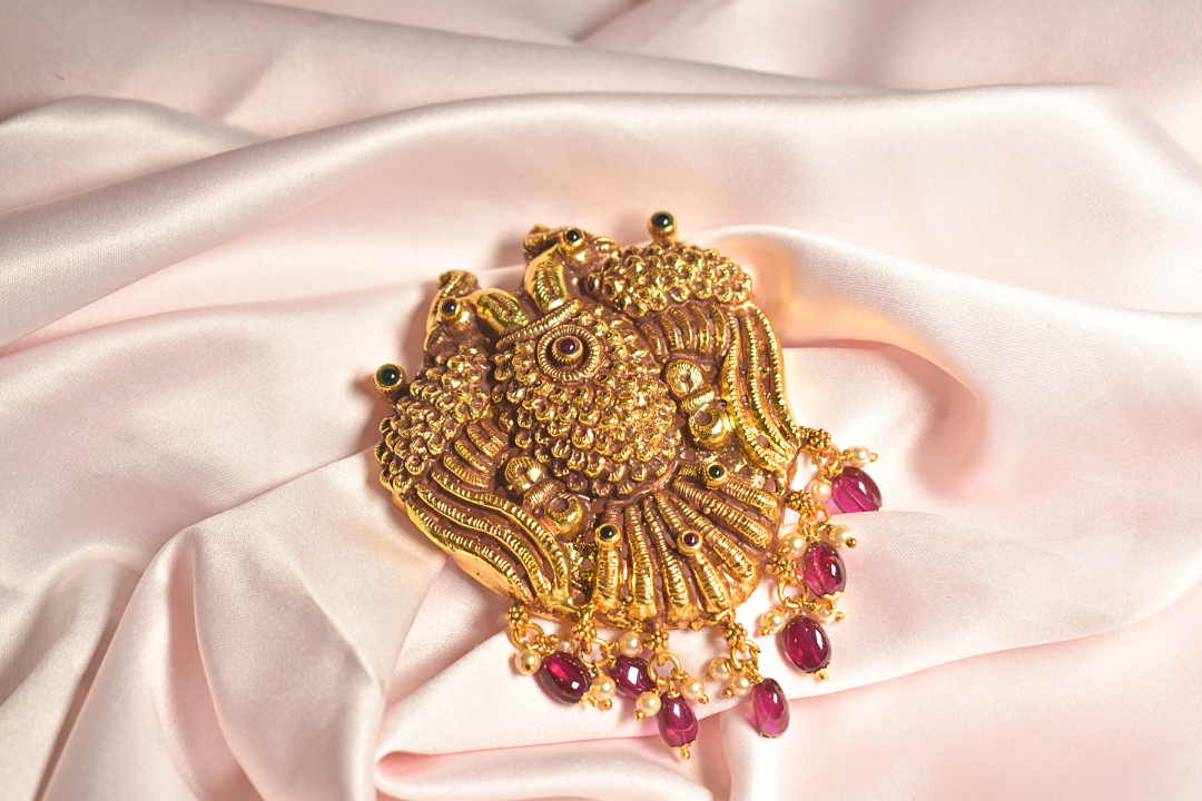 Exquisite Gold Peacock Pendant with Ruby & Pearl Embellishments