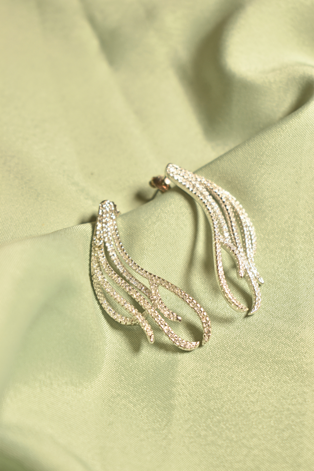 Ethereal Elegance Flowing Winged Silver Earrings