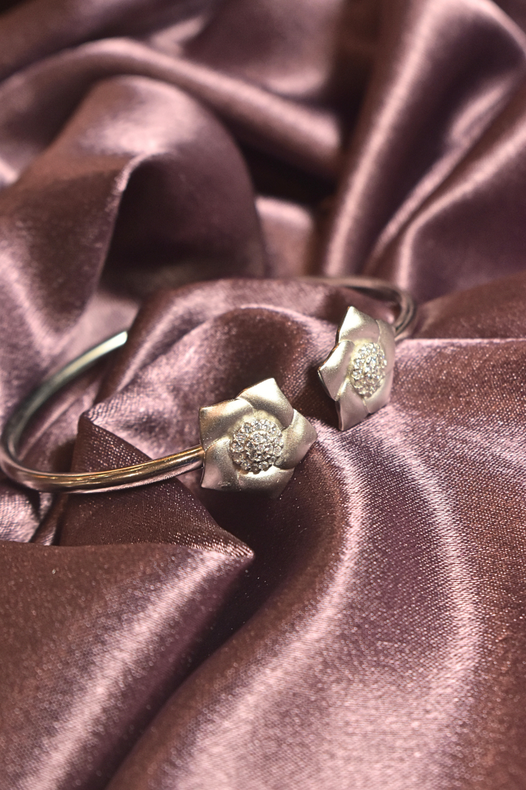 Elegant Floral Cuff with Radiant Crystal Centerpieces
