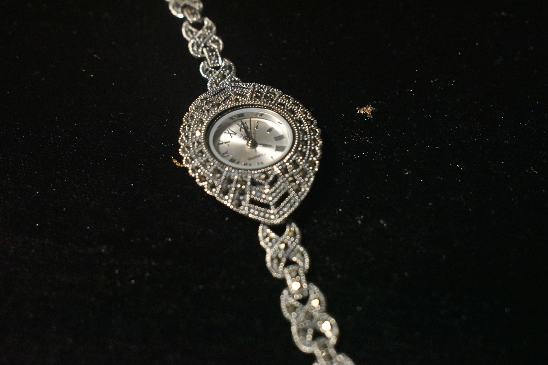 Elegant Silver Charm Intricately Designed Bracelet Watch for Sophisticated Style