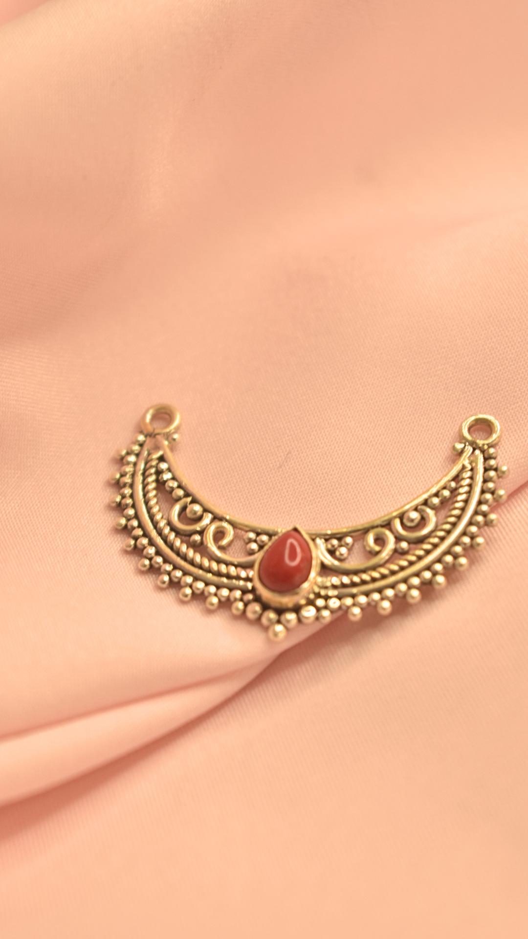 Delicate Gold Tone Pendant with Red Teardrop Stone