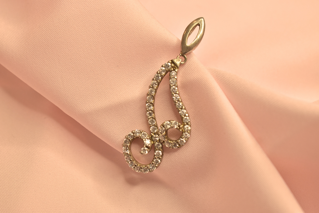 Elegant Swirl Earrings and Pendant Set