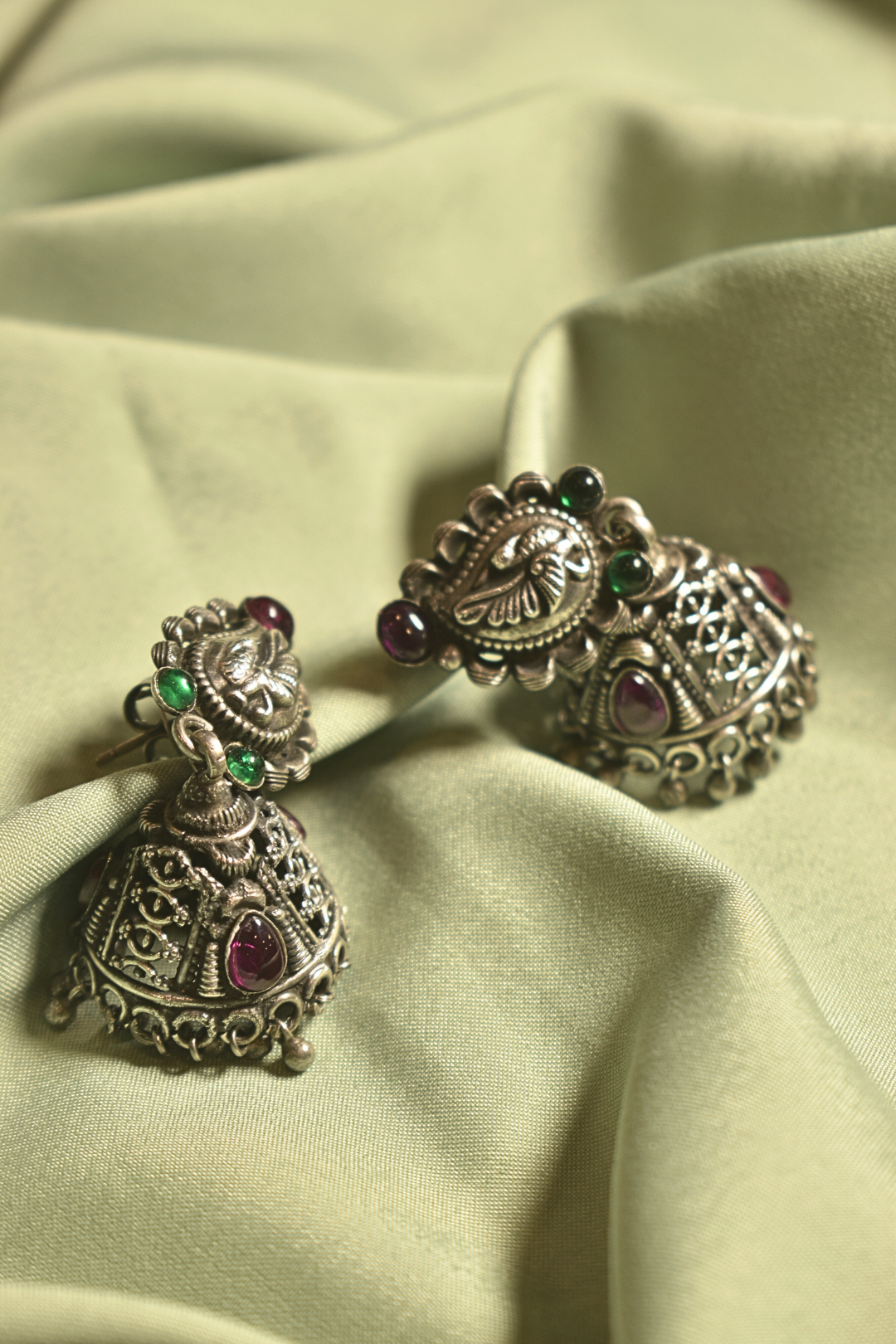 Regal Enchantment Intricate Silver Jhumkas with Gemstone Details