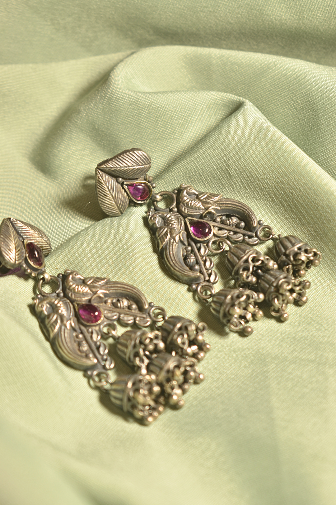 Peacock Splendor Intricate Silver Danglers with Ruby Highlights