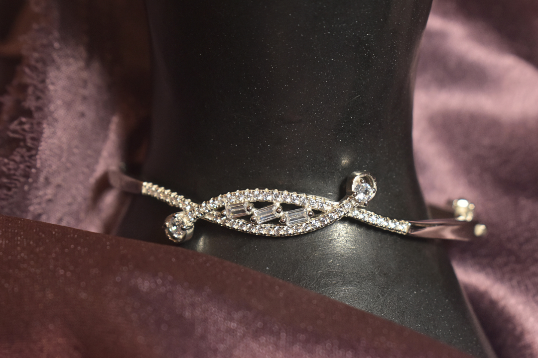 Elegant Twist Bangle with Intricate Crystal Detailing