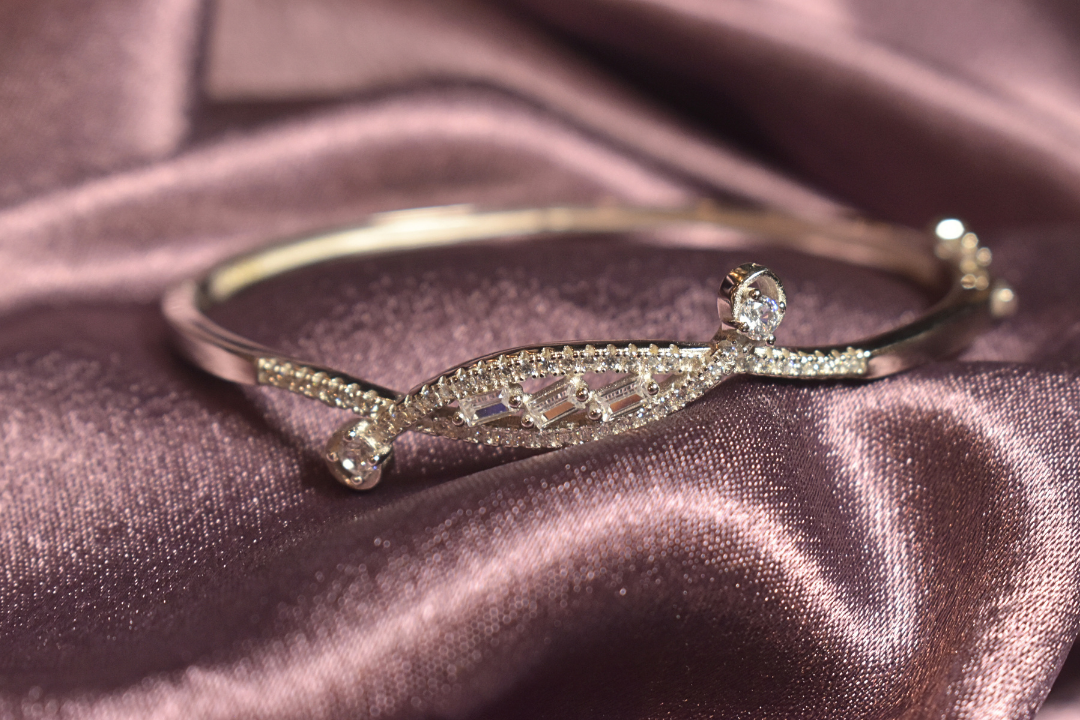 Elegant Twist Bangle with Intricate Crystal Detailing