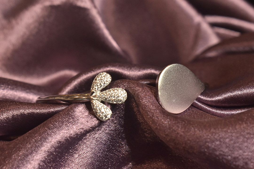 Minimalist Elegance Open Bangle with Leaf and Pebble Design