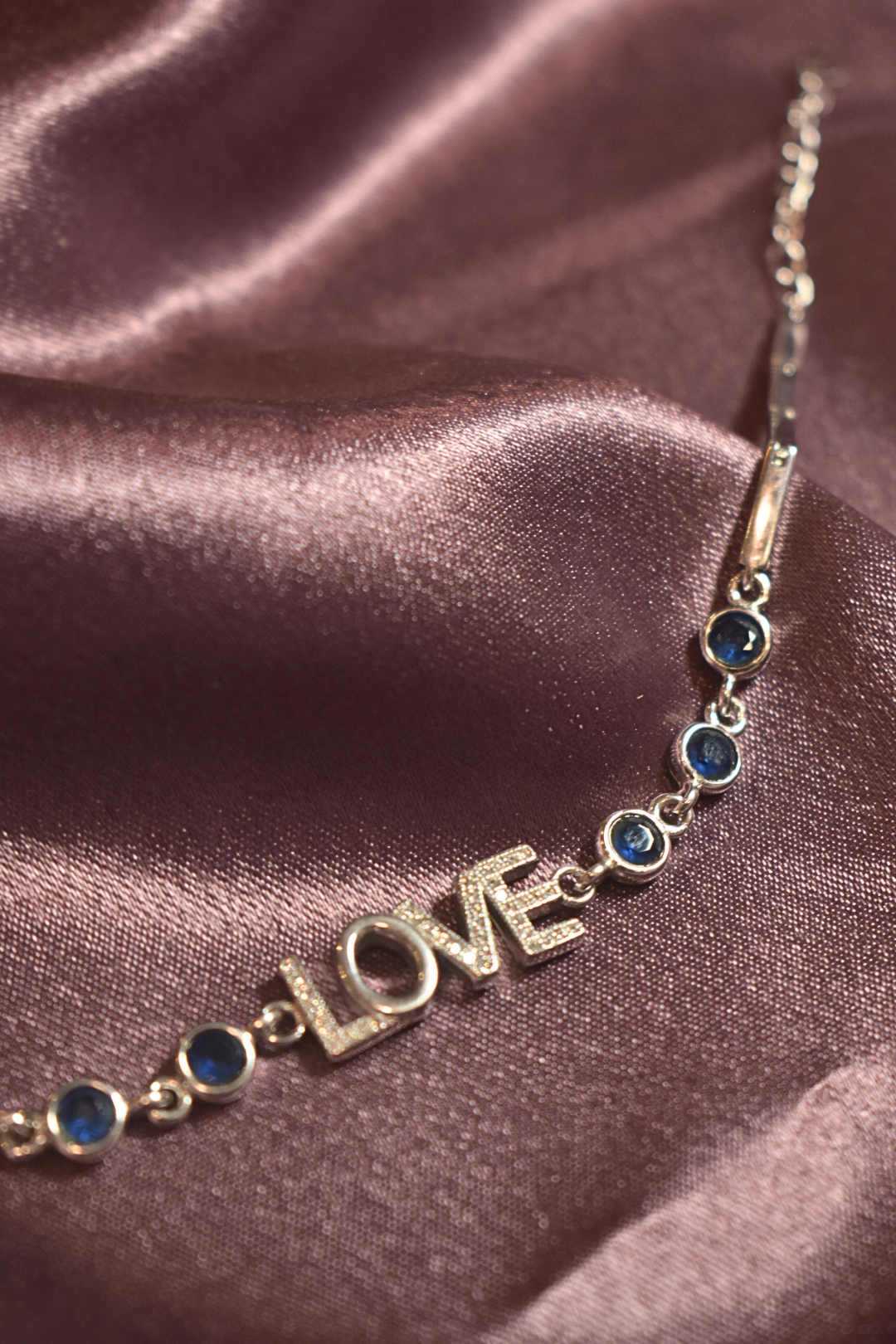 Love-Inspired Bracelet with Elegant Blue Accents