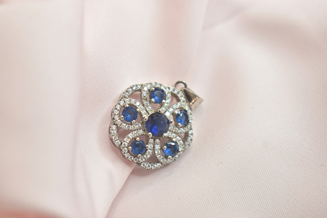 Blue Sapphire and Silver Floral Earrings and Pendant Set