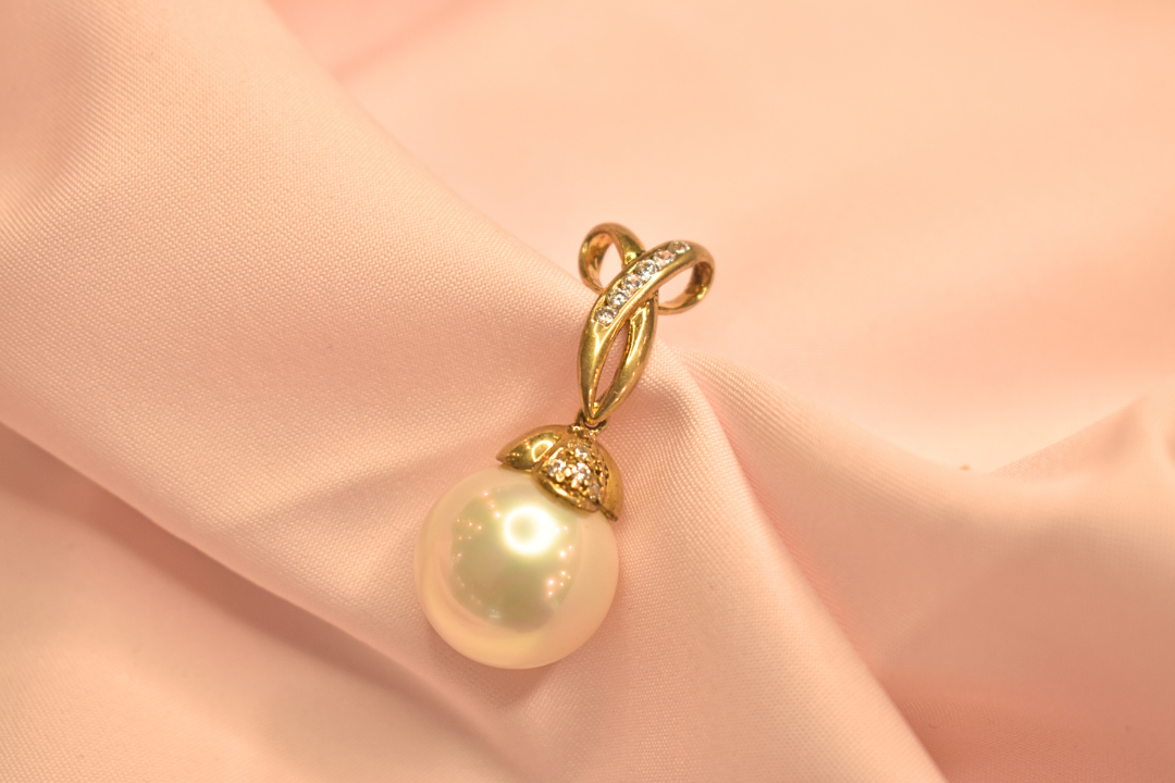 Elegant Pearl and Diamond Drop Earrings and Pendant Set