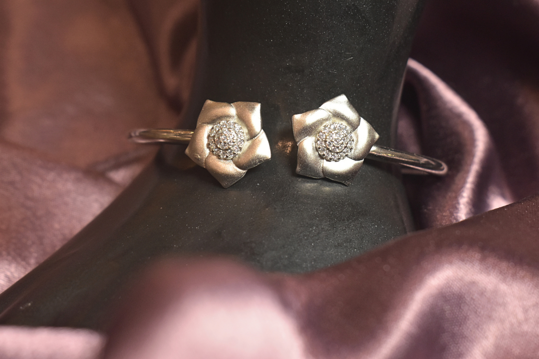 Elegant Floral Cuff with Radiant Crystal Centerpieces