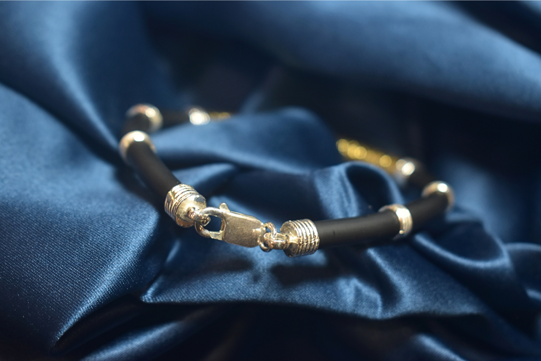 Modern Black and Gold Bracelet with Silver Detailing