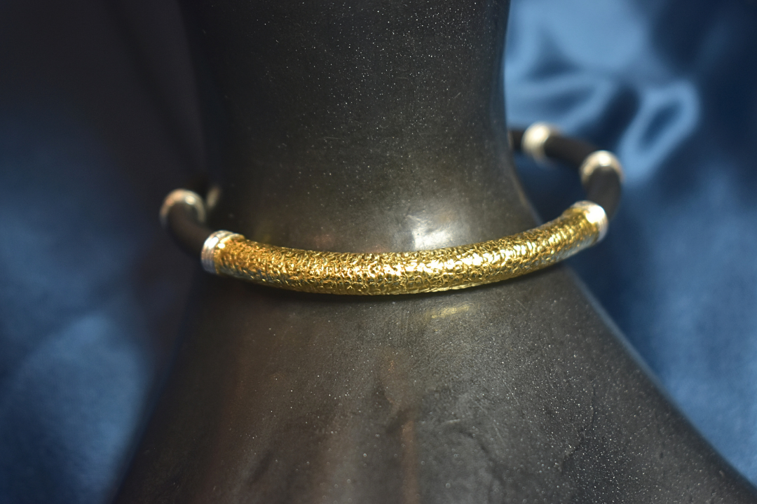 Modern Black and Gold Bracelet with Silver Detailing