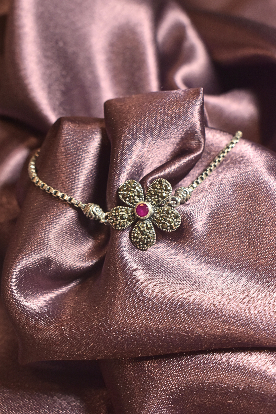 Vintage Floral Bracelet with a Ruby Centerpiece