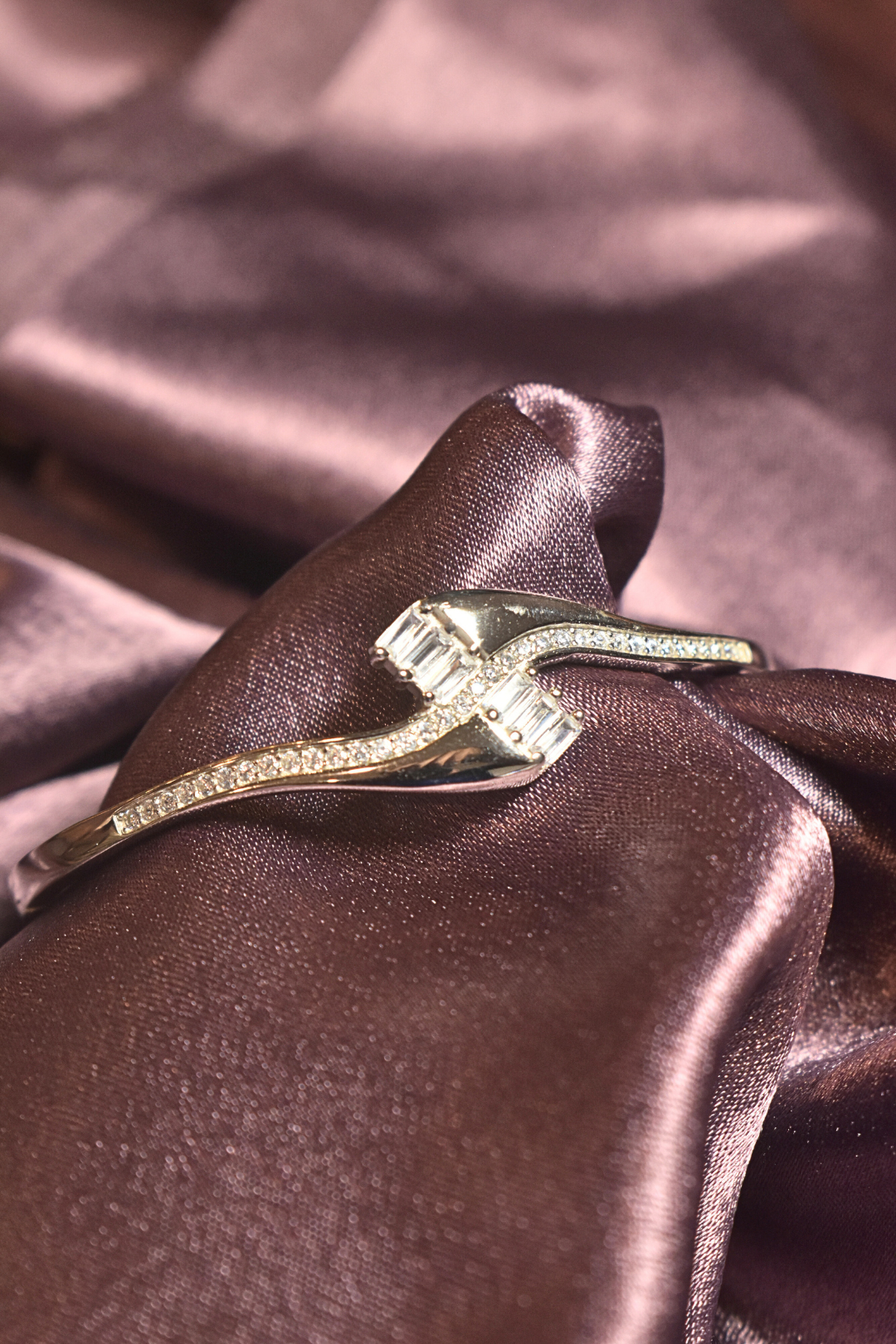 Sleek Crossover Bracelet with Baguette and Pavé Accents