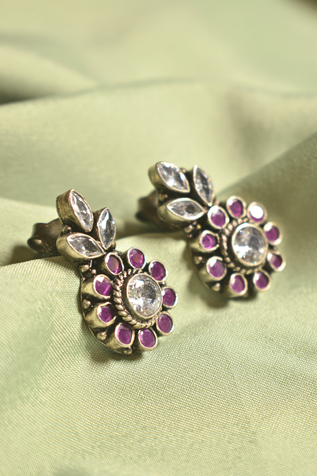 Elegant Floral Silver Earrings with Ruby Accents