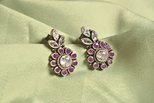 Elegant Floral Silver Earrings with Ruby Accents