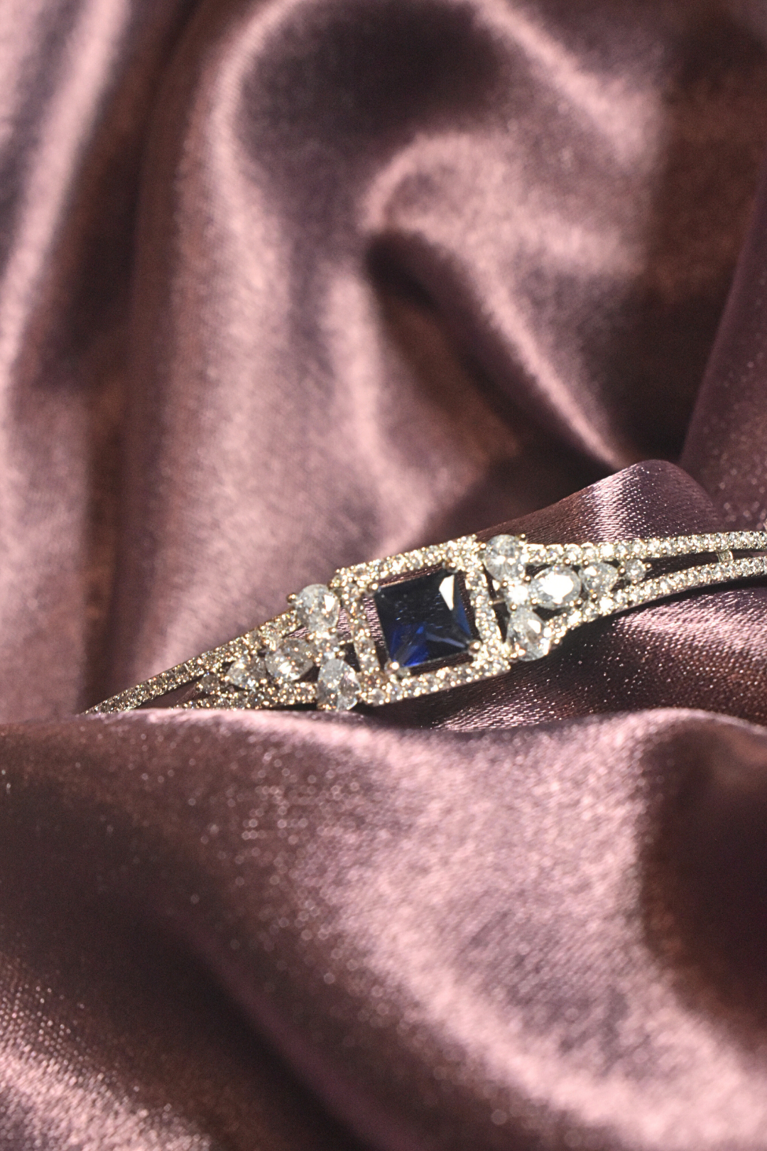 Royal Elegance Bracelet with Sapphire Centerpiece and Radiant Crystals