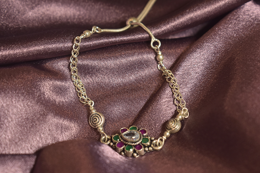Traditional Floral Bracelet with Green and Pink Accents