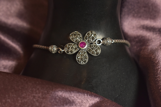 Vintage Floral Bracelet with a Ruby Centerpiece