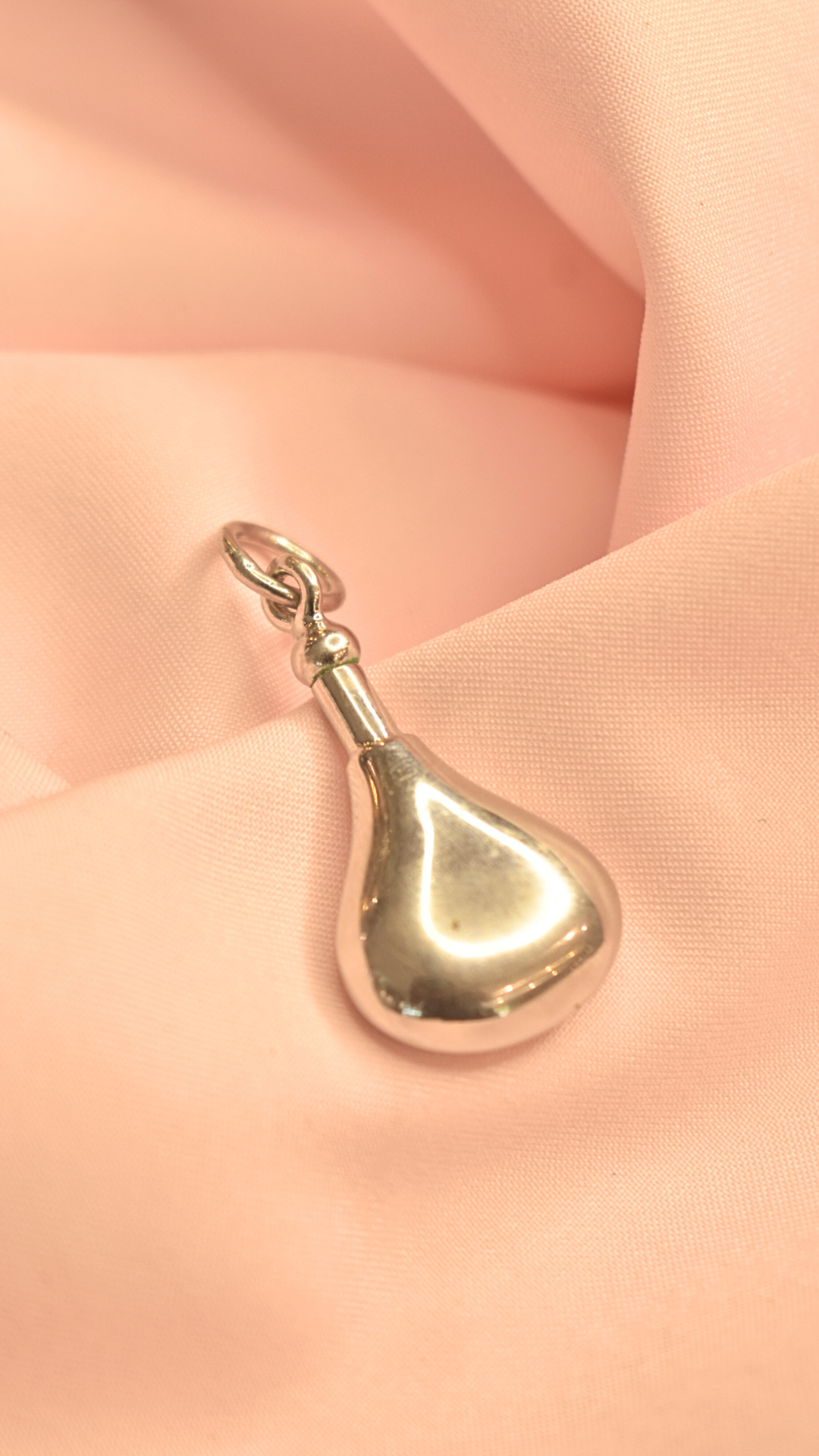 Delicate Gold Tone Pendant with Red Teardrop Stone