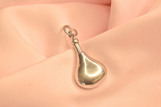 Delicate Gold Tone Pendant with Red Teardrop Stone