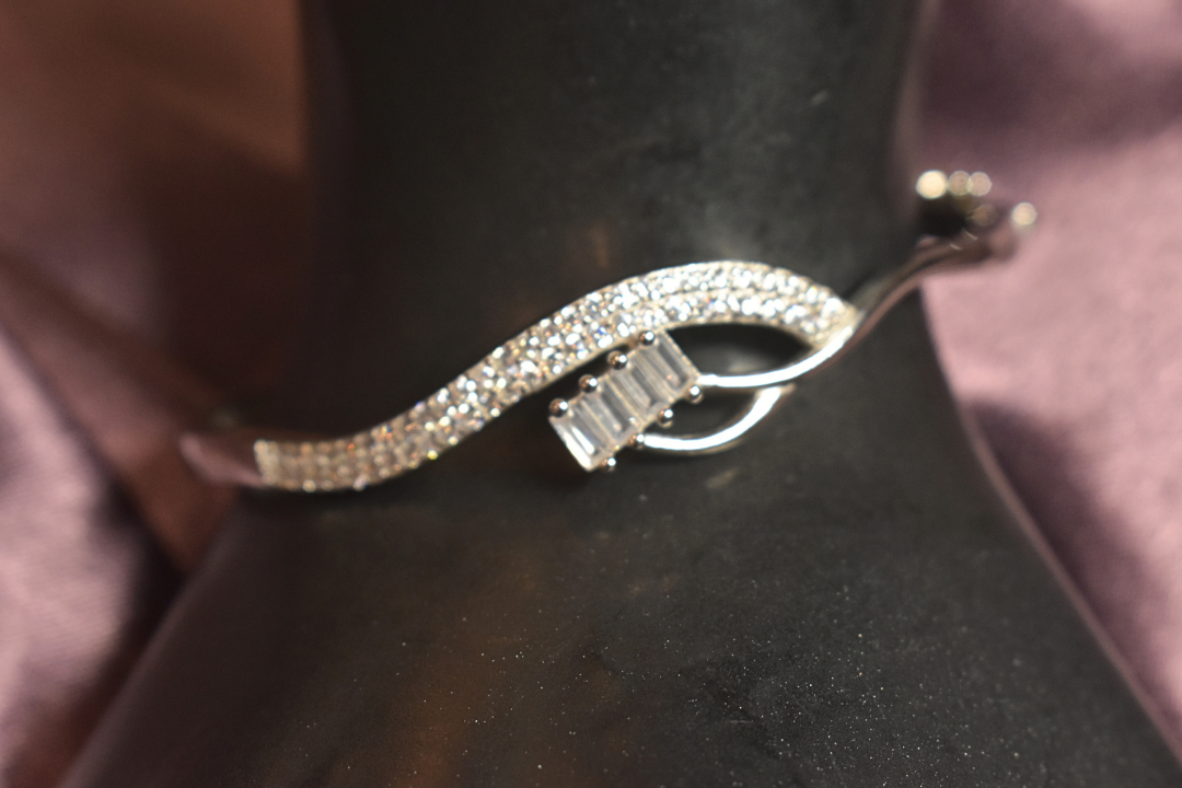 Graceful Wave Bracelet with Dazzling Crystal Accents