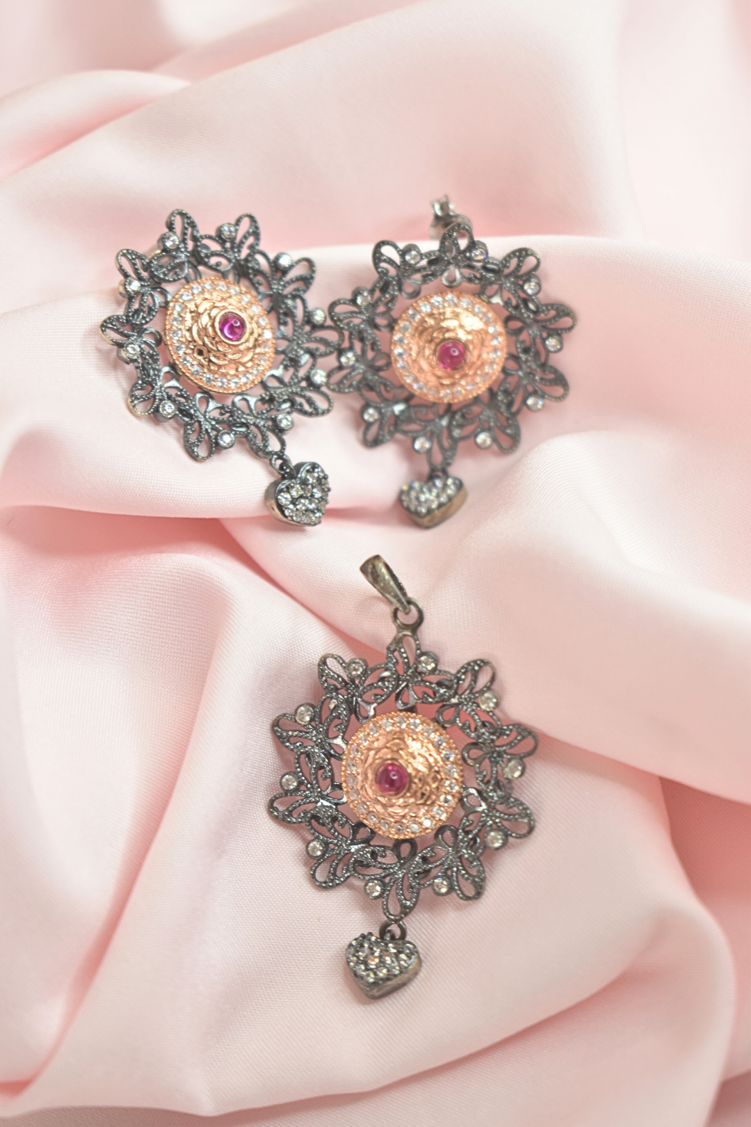 Elegant Floral Earrings and Pendant Set with Rose Gold Accents and Ruby Detailing