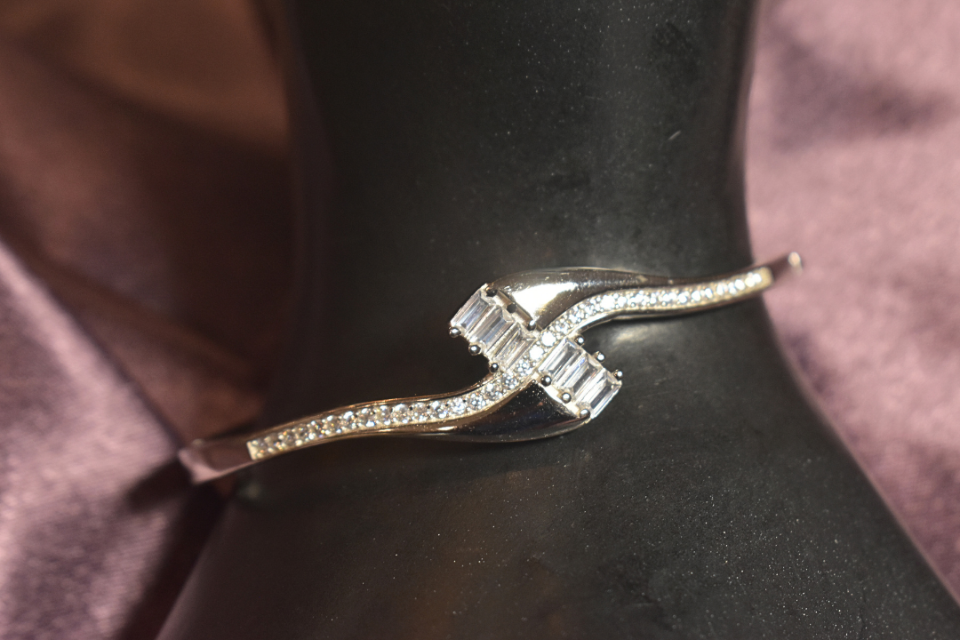 Sleek Crossover Bracelet with Baguette and Pavé Accents