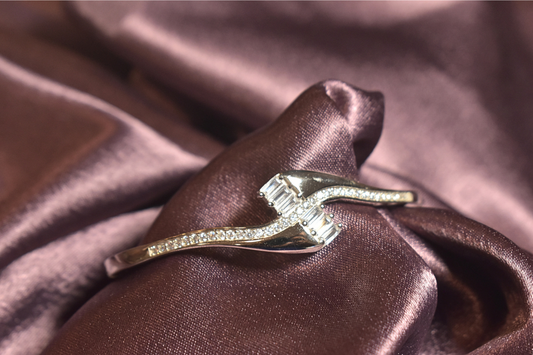 Sleek Crossover Bracelet with Baguette and Pavé Accents