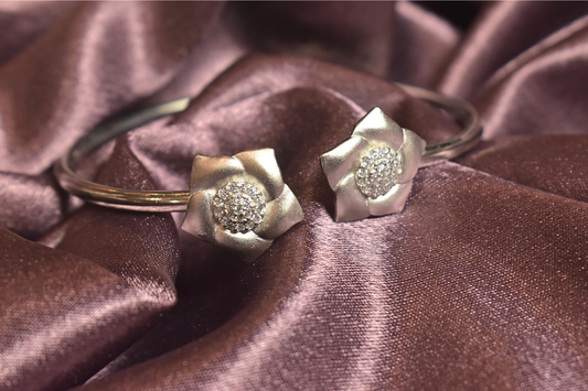 Elegant Floral Cuff with Radiant Crystal Centerpieces