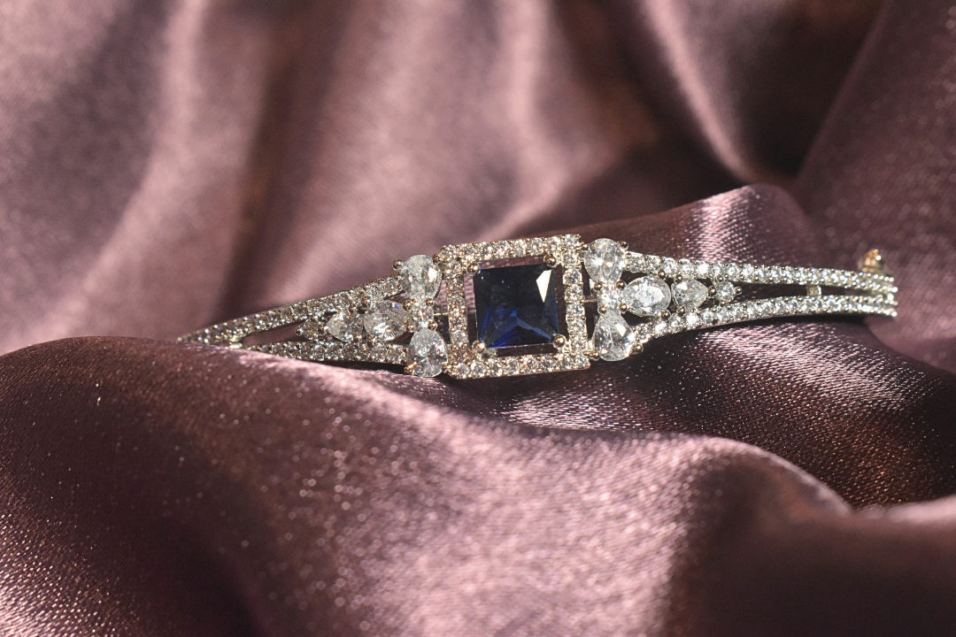 Royal Elegance Bracelet with Sapphire Centerpiece and Radiant Crystals