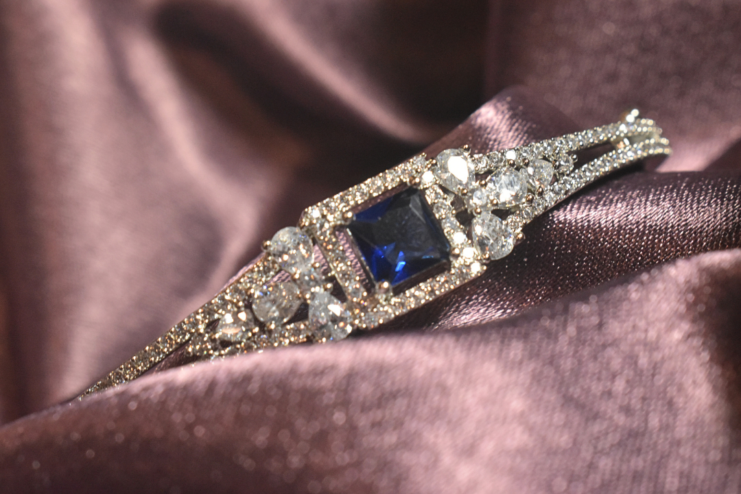 Royal Elegance Bracelet with Sapphire Centerpiece and Radiant Crystals