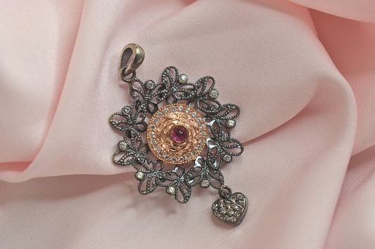 Elegant Floral Earrings and Pendant Set with Rose Gold Accents and Ruby Detailing