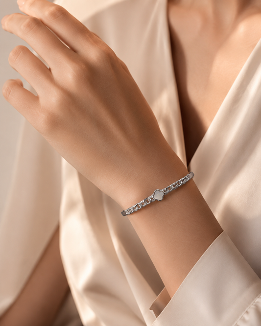 Hinged Cleef Silver Charm